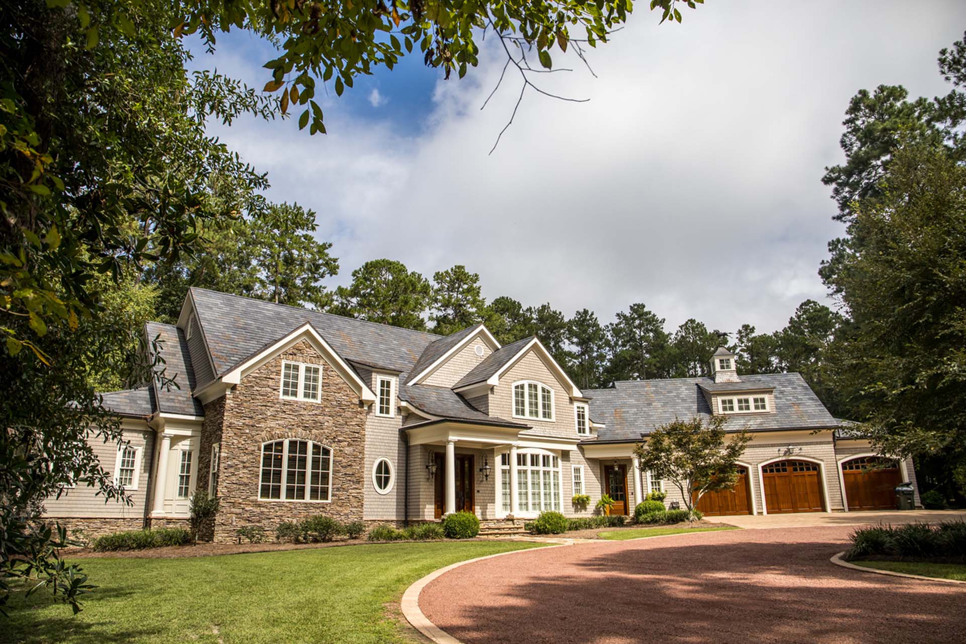 Luxury home with roundabout driveway